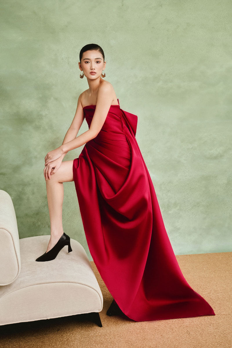 Elegant Ruby Drape Couture gown by White Plan with flowing fabric and intricate draping, perfect for formal occasions.