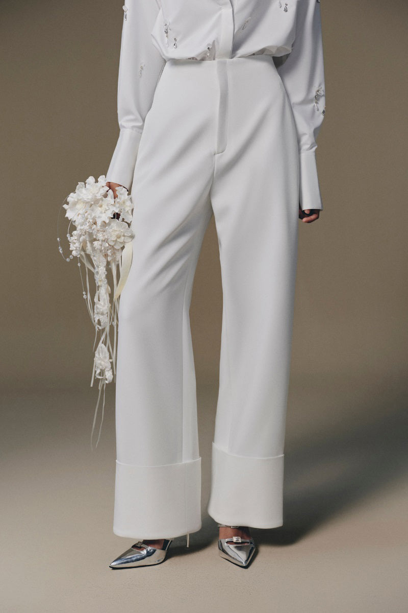 Keira Tong beaded shirt with intricate beadwork and stylish design, showcasing the detailed craftsmanship of the shirt.