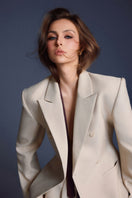 Keira Tong double-breasted flap blazer in classic tailored style, featuring structured lapels and sleek design.