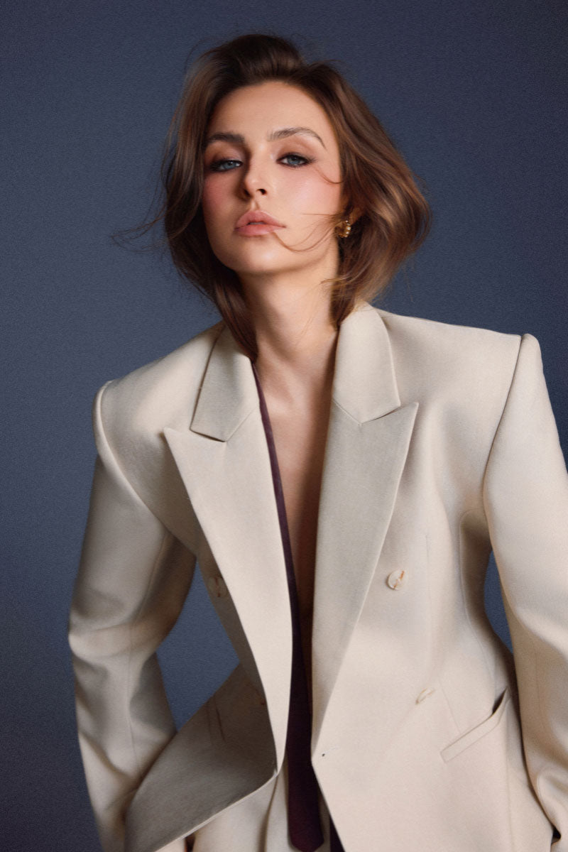 Keira Tong double-breasted flap blazer in classic tailored style, featuring structured lapels and sleek design.