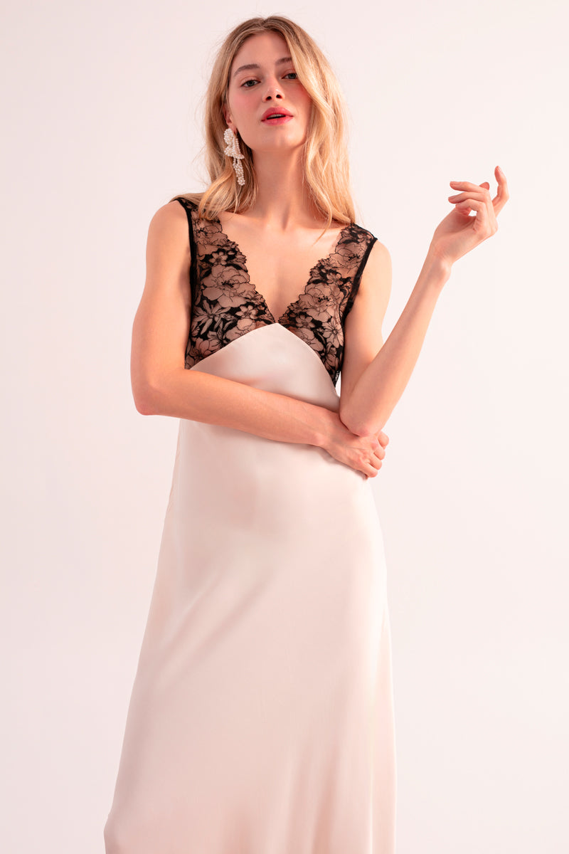 OvertheSea ivory shadow dress, a stylish maxi dress with a flowing silhouette and elegant design, showcased in the image.
