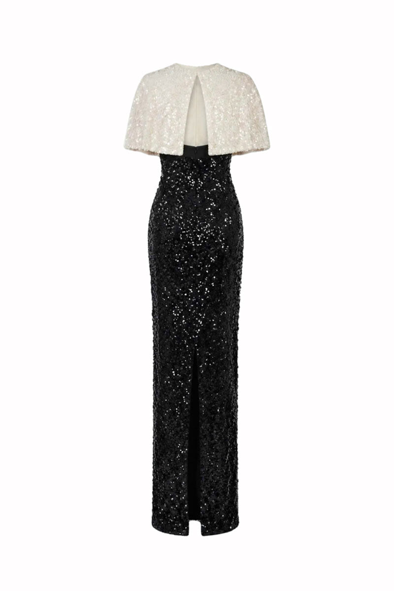 Black Luna Cape Gown by HACCHIC COUTURE, elegant maxi dress with flowing cape detail, showcased on a model.