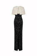 Black Luna cape gown by HACCHIC COUTURE featuring flowing fabric and elegant design, perfect for formal occasions.
