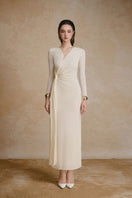Golden maxi dress by Arti Apparel featuring a flowing fabric and elegant design, perfect for formal or casual occasions.