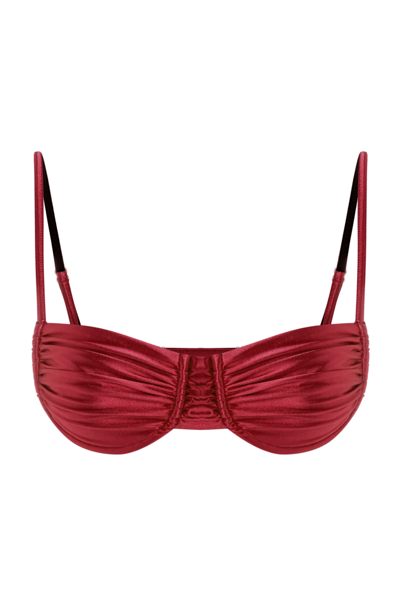 Suncillo Gina Glossy Top Bikini in vibrant cherry red with a shiny, glossy finish, styled as a fashionable swimwear top.