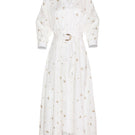 Estefania maxi dress featuring elegant ivory and gold camellia and lilies floral pattern, flowing shirt dress style.