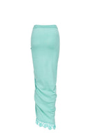 Mint green crochet knit midi skirt with handmade embroidery by Andreeva, featuring intricate floral patterns.