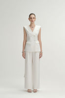 White Rosa vest top by Arti Apparel, sleeveless design with a fitted silhouette, perfect for casual or layered outfits.