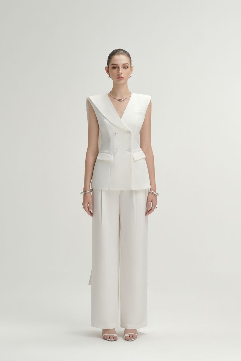 White Rosa vest top by Arti Apparel, sleeveless design with a fitted silhouette, perfect for casual or layered outfits.