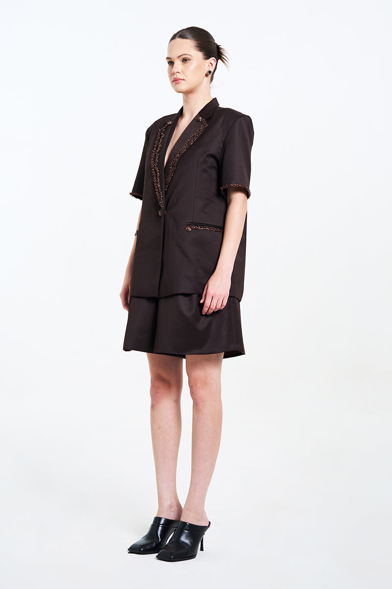 Aidan & Ice NARA brown blazer with tailored fit, notch lapel, and front pockets, displayed on a neutral background.