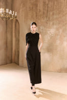 Arti Apparel Lyn Pants in neutral fabric, featuring a relaxed fit and stylish design, displayed on a hanger.