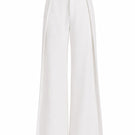 Folded Keira Tong layered pants in neutral fabric, showcasing the stylish design and texture of the pants.