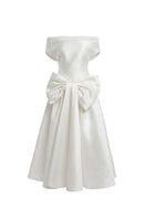White Plan Charlotte maxi dress featuring a flowing fabric and elegant design, perfect for summer occasions.