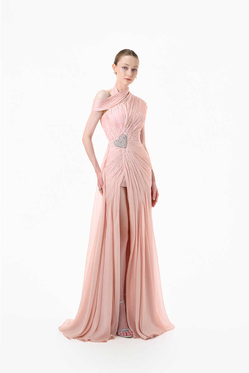 Elegant blush rose pleated draped maxi gown by Happy Clothing, featuring flowing fabric and sophisticated design.
