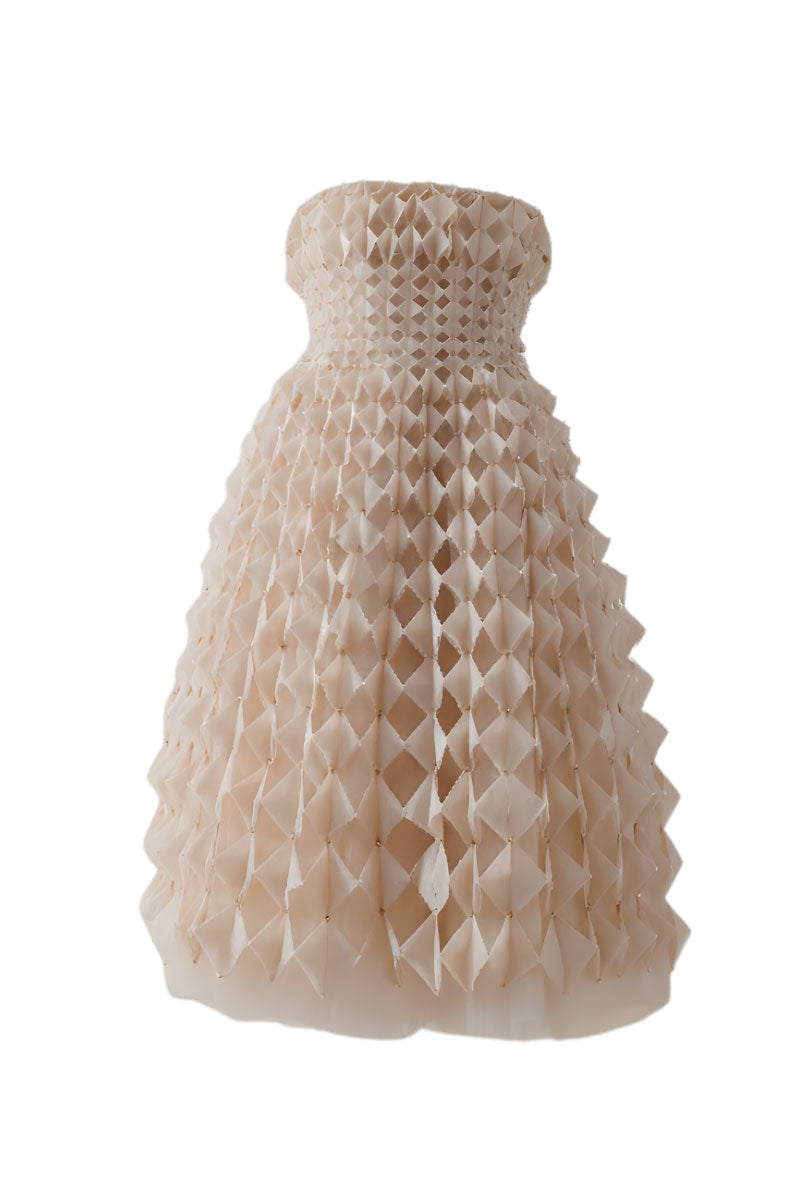 Nude origami-pleated strapless midi dress by DOC BAN, showcasing its elegant pleated design and fitted silhouette.