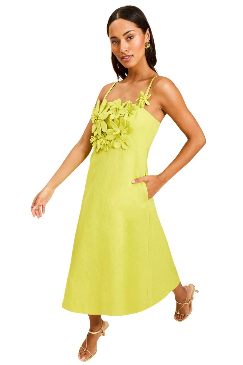 Mestiza New York Esperanza midi dress in vibrant citrus green, flowing midi dress with a fitted waist and elegant design.