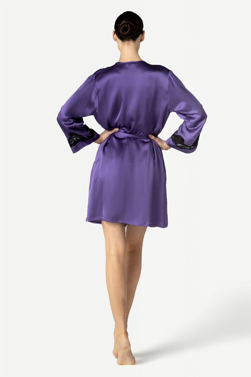 NK IMODE Morgan short robe in frosted violet, lightweight and cozy, shown hanging with soft fabric texture and vibrant color.