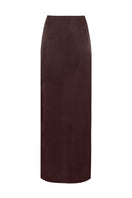 Brown maxi skirt by Laura Escobar, flowing fabric and elegant design, shown in a full-length image.