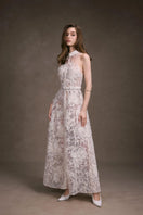 Keira Tong Daphne Shirt Dress, a stylish maxi dress with button-down front and lightweight fabric, displayed on a hanger.
