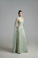 Elegant flower wave A-line gown with scarf detail from Happy Clothing, featuring floral patterns and flowing fabric.