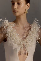 Elegant white gown from White Plan's Envious Dress collection, featuring a flowing design and intricate detailing.