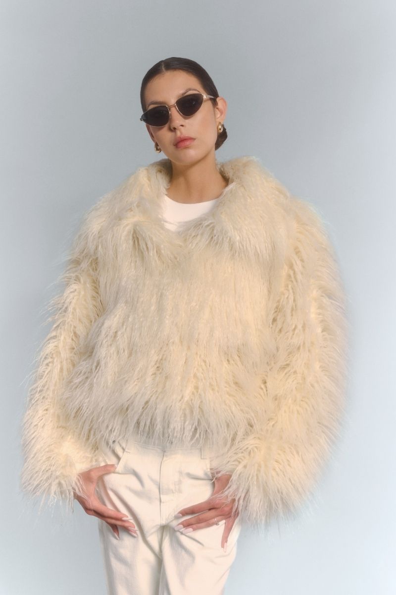 Fortini fluffy faux fur jacket in ecru, cozy and stylish, with a soft textured surface and classic jacket silhouette.