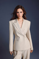 Keira Tong lined pants featuring a comfortable fit with visible lining and tailored design in a stylish, neutral color.