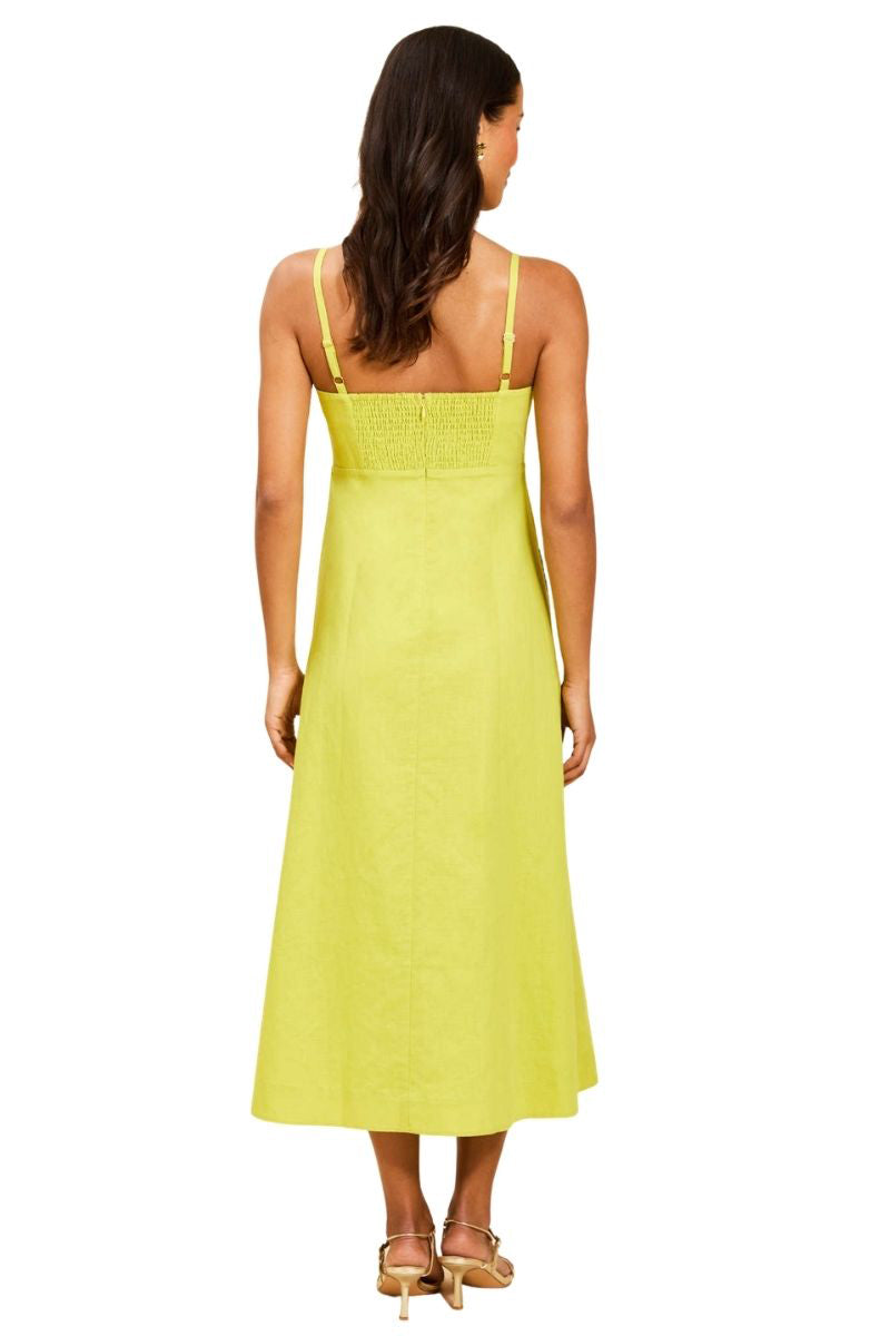 Mestiza New York Esperanza midi dress in vibrant citrus green, sleeveless with a flowy silhouette and stylish neckline.