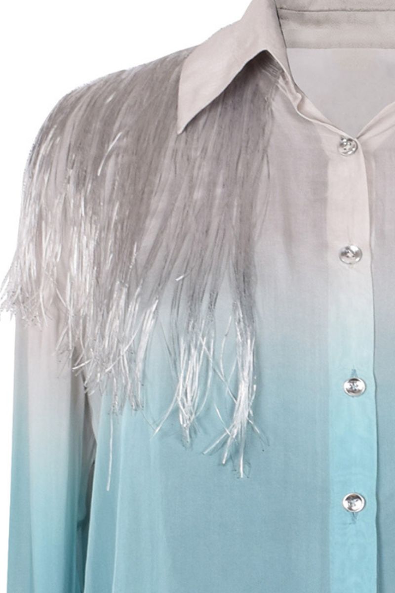 AKHL silk blouse with fringe details and gradient design, showcasing elegant, flowing fabric and stylish top for women.