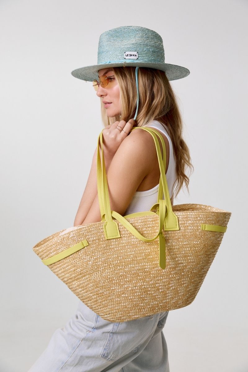 Yellow summer shoulder bag by LE SH KA featuring a stylish, spacious design with a comfortable shoulder strap.