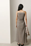 Leica square-neck column maxi dress displayed on a hanger, featuring elegant design and flowing fabric.