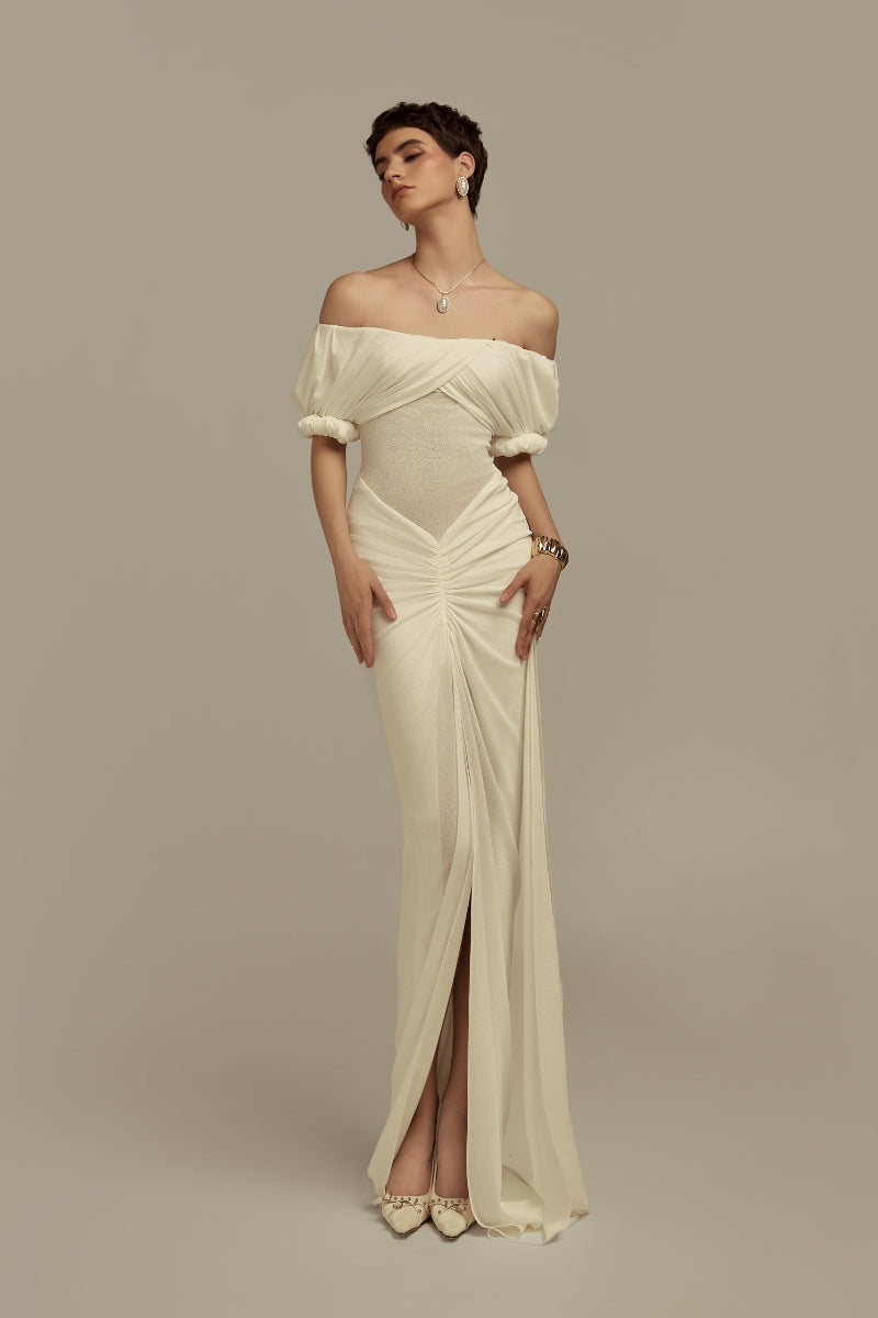 White Hemera maxi dress by POEM, flowing fabric with a relaxed fit, perfect for casual or summer wear.