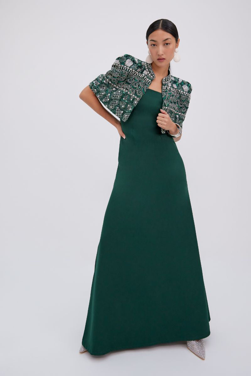 Elegant Beatrice gown by Raishma featuring intricate lace details and a flowing silhouette, perfect for formal occasions.