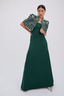 Raishma Beatrice gown featuring elegant fabric and detailed design, perfect for formal occasions and special events.