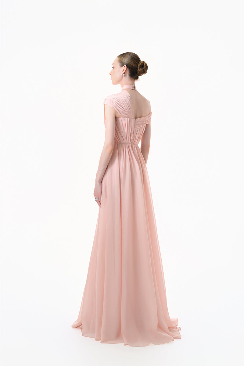 Elegant blush rose pleated draped maxi gown by Happy Clothing, featuring flowing fabric and sophisticated design.