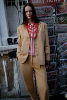 Brown ColoReve blazer shown on a hanger, featuring a tailored fit and classic lapel for stylish office and casual wear.