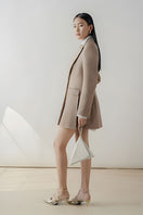 Taupe pleated blazer dress by DOC BAN, featuring a tailored blazer style with a pleated skirt, stylish and sophisticated for women.