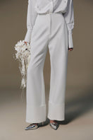 Beaded pants by Keira Tong featuring intricate beadwork and a stylish, contemporary design for fashionable wear.