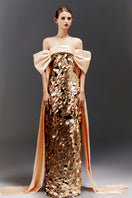Elegant pink gown by Happy Clothing with paillette bow sleeves, featuring a flowing design and intricate embellishments.