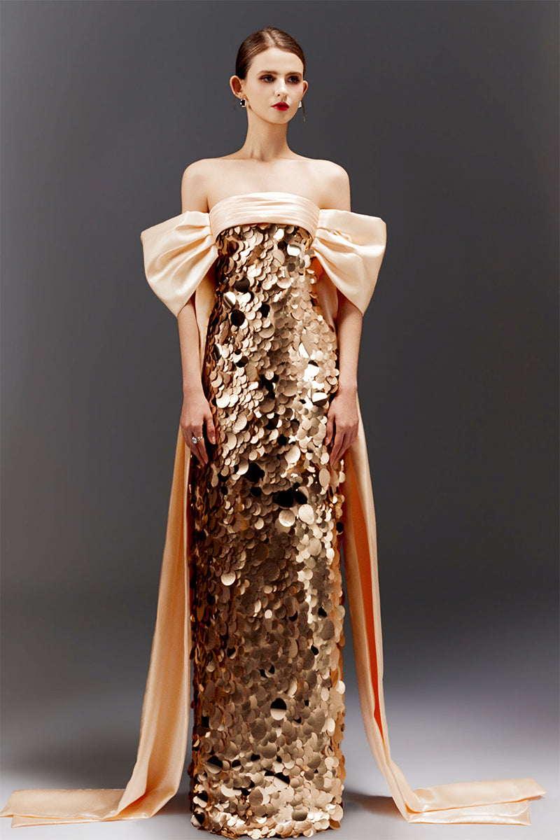 Elegant pink gown by Happy Clothing with paillette bow sleeves, featuring a flowing design and intricate embellishments.