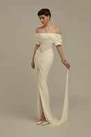 White Hemera maxi dress by POEM featuring a flowing fabric and elegant design, perfect for casual or formal occasions.