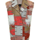 Lalo Avril vest in red and gold knitwear with a textured pattern, featuring a stylish, cozy design perfect for cooler weather.