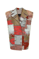 Lalo Avril vest in red and gold knitwear with a textured pattern, featuring a stylish, cozy design perfect for cooler weather.