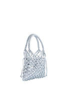 Adriana Castro La Red Mini Leather Silver top handle bag with sleek design and silver hardware.