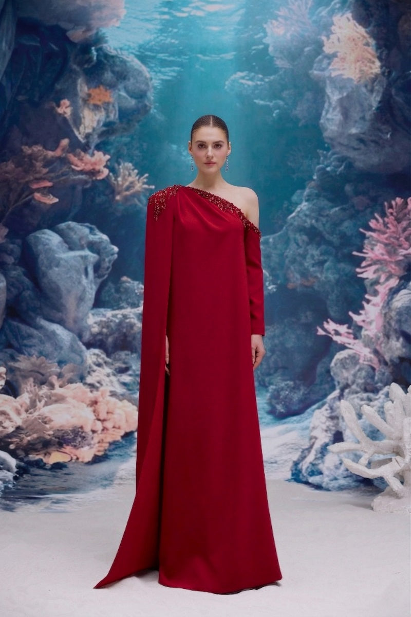 Red LINNEA crepe gown by 21Six, featuring elegant flowy fabric and a stylish silhouette, perfect for formal occasions.