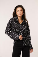 Señorita Antonia Polka Blouse in black and white, stylish shirt with polka dot pattern, long sleeves, and classic collar.