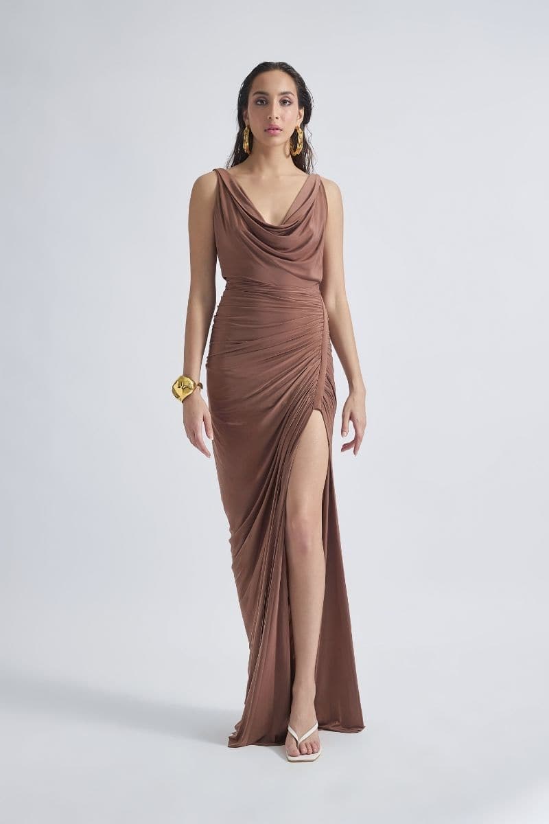 Deme by Gabriella CULT MIA X DEME maxi dress in flowy fabric with floral pattern and V-neck design, displayed on a hanger.
