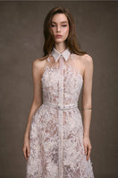 Keira Tong Daphne Shirt Dress, a stylish maxi dress with a button-up front and relaxed fit, displayed on a hanger.