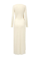 Golden maxi dress by Arti Apparel featuring a flowing design and elegant fabric, shown on a model.