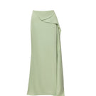 Baobab Lorena Maxi Skirt in flowing fabric with a stylish pattern, displayed on a hanger.